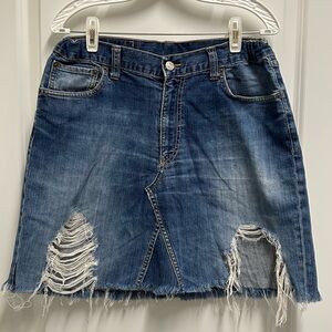 Levi's Blue Denim Mini Skirt with Ripped Accents
Size S/M